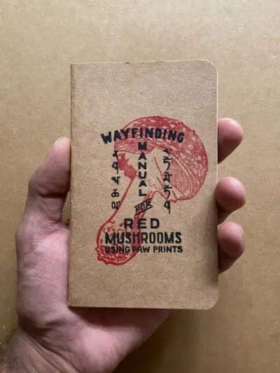 Way Finding Manual Red Mushroom Using Paw Prints Notebook