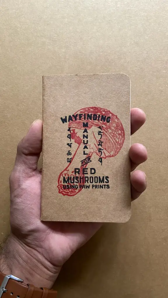 Way Finding Manual Red Mushroom Using Paw Prints Notebook
